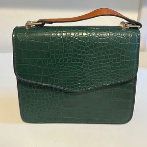 Green leather handbag